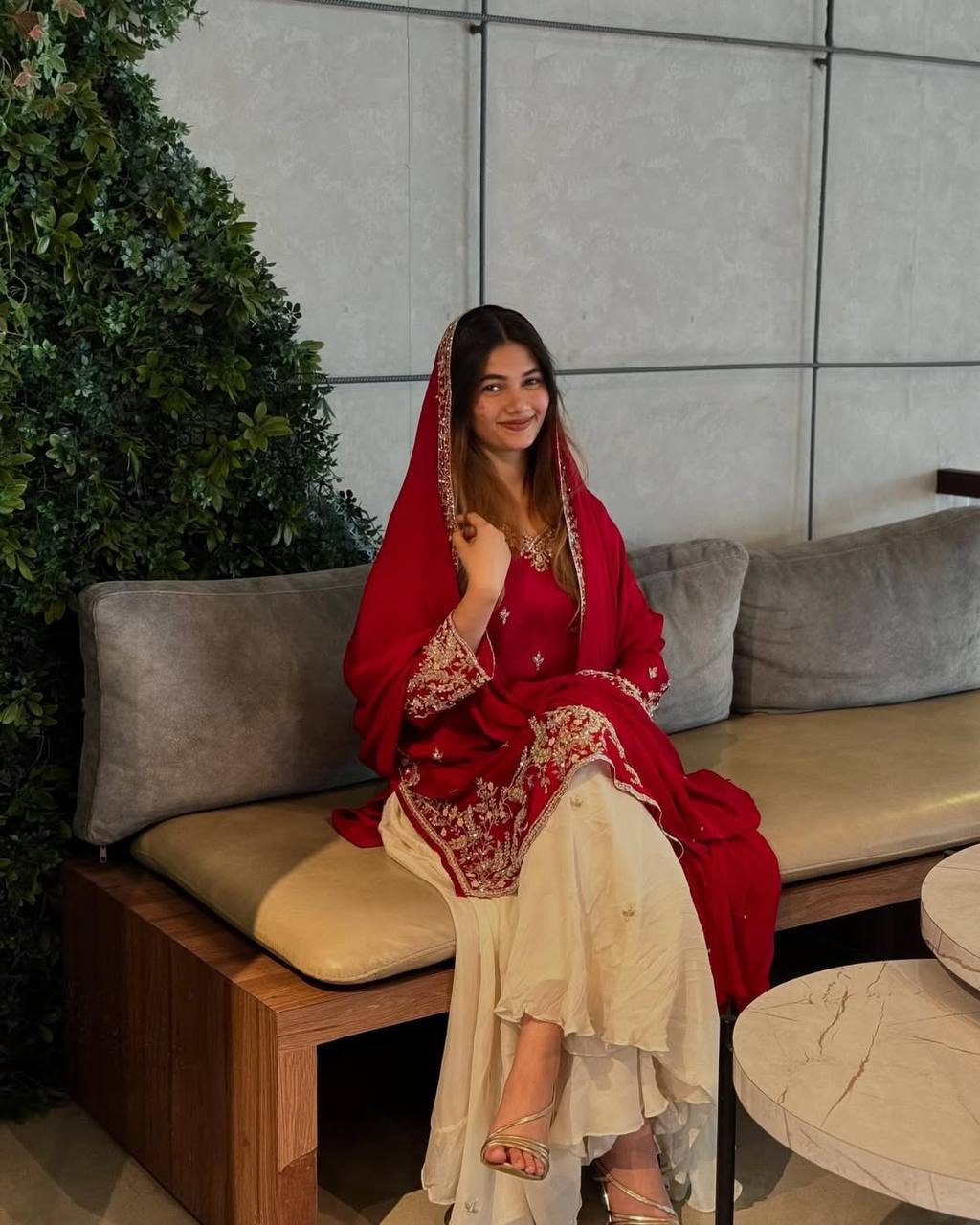 A Showcase of Pakistani Dress Styles in Four Captivating Colors Worn by a Graceful Woman