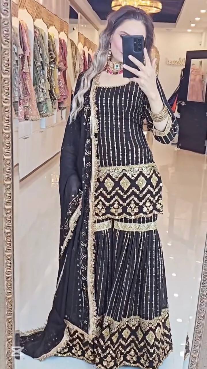 A Captivating Showcase of a Woman in Bold Black and Vibrant Yellow Attire