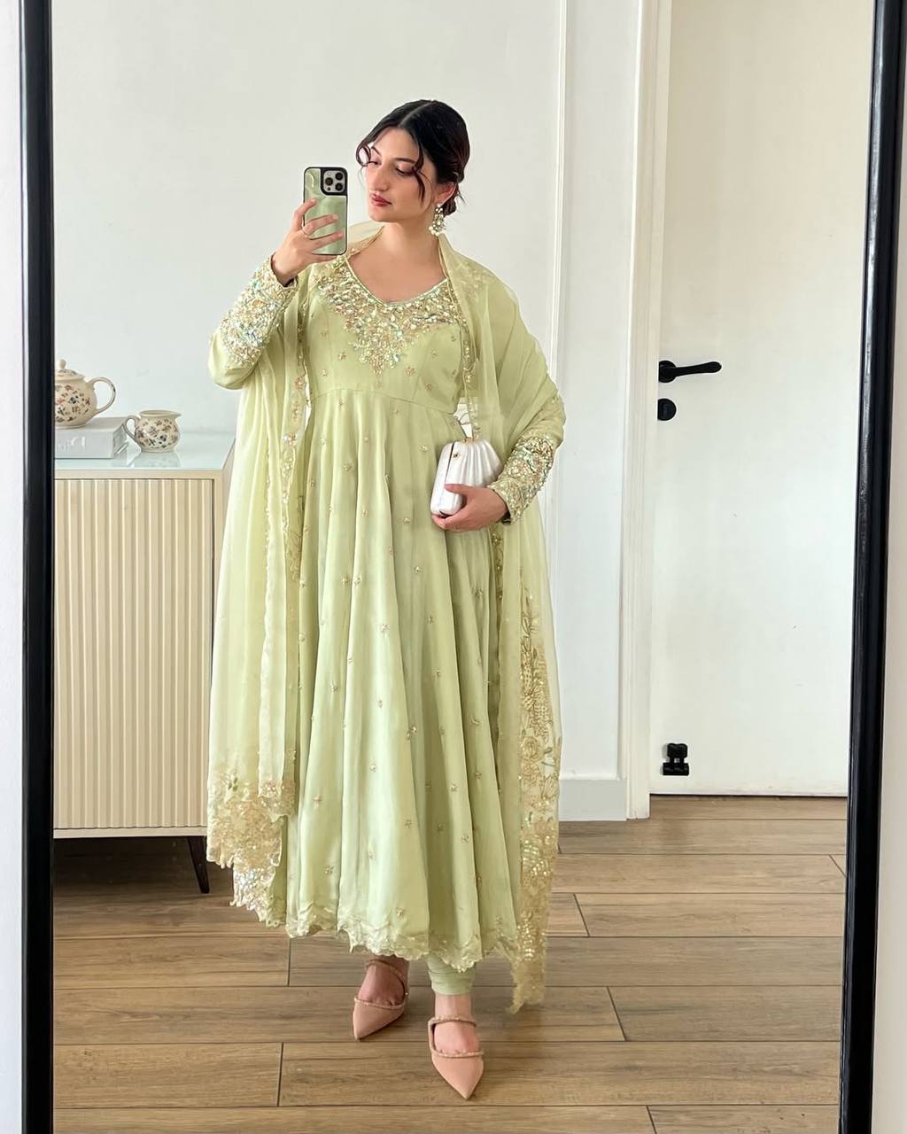 A Stylish Woman in a Green Dress