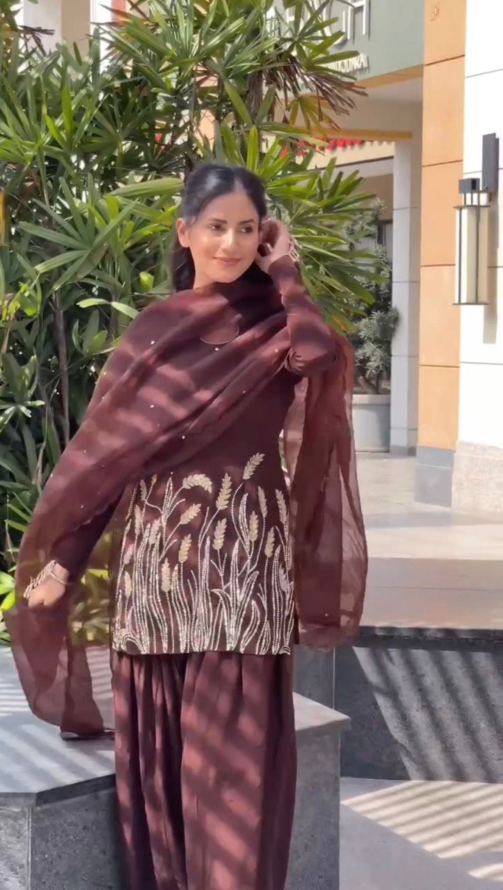 A Captivating Moment of Grace in a Brown Dress