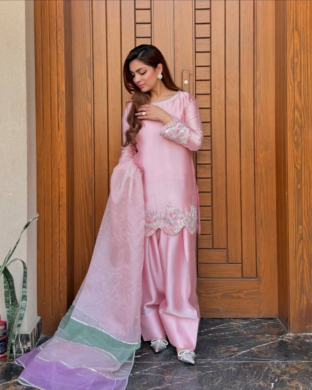 A Fashion-Forward Woman in Pink Suit