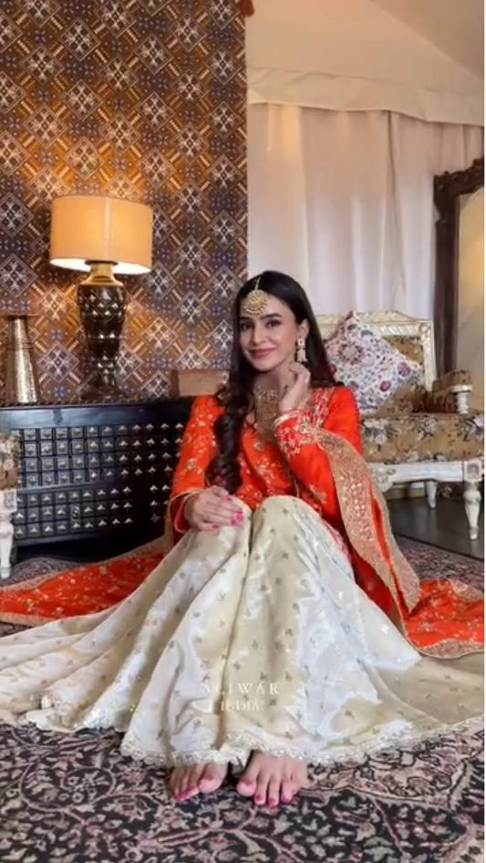A Regal Blend of Fiery Orange and Ivory Elegance