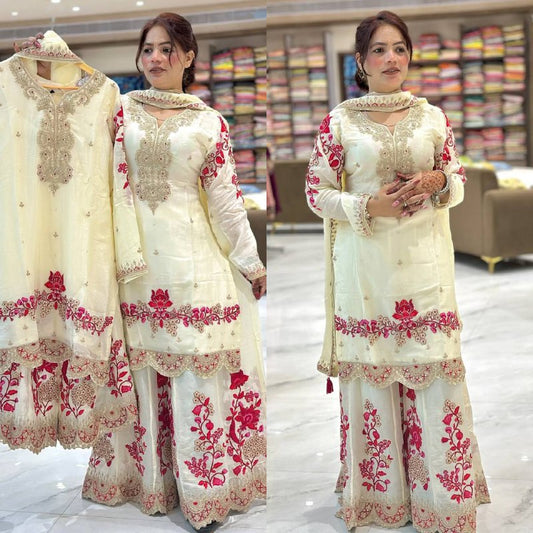 A Fashionable Woman in a White and Pink Suit Ensemble