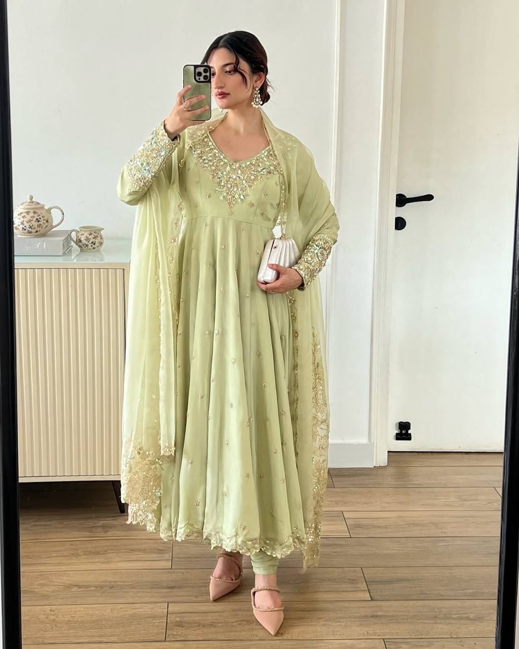 A Stylish Woman in a Green Dress