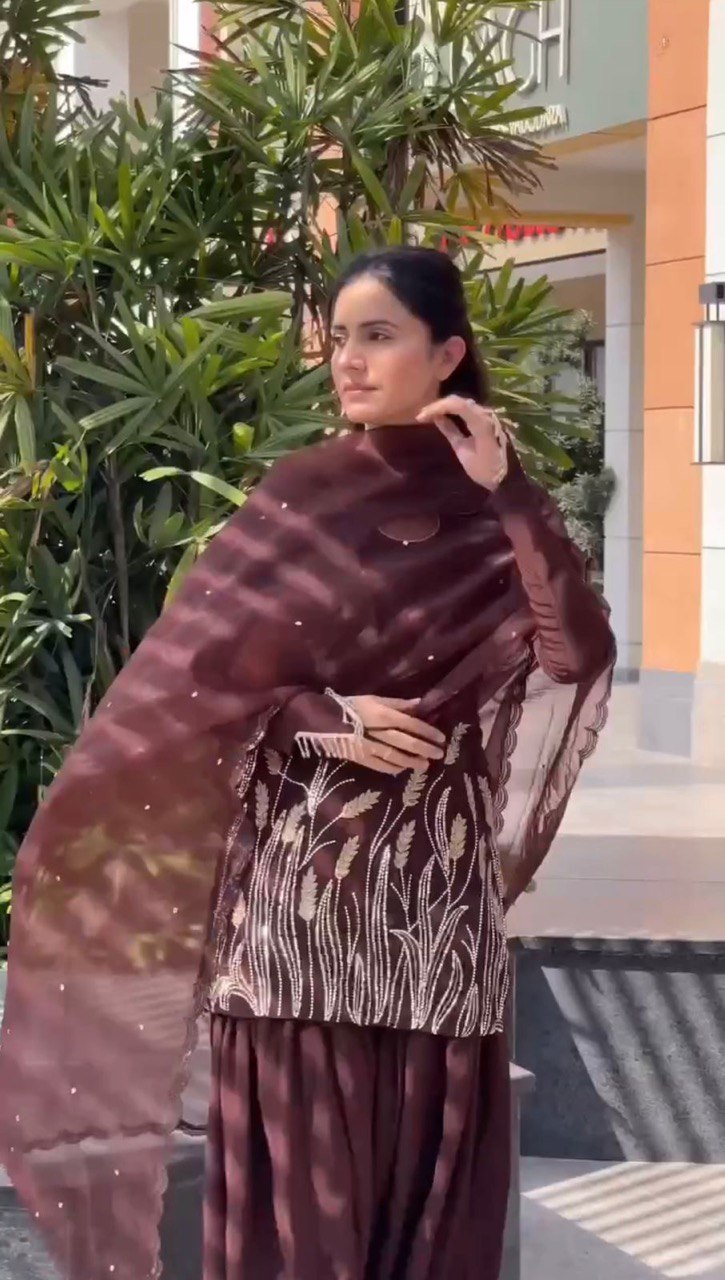 A Captivating Moment of Grace in a Brown Dress