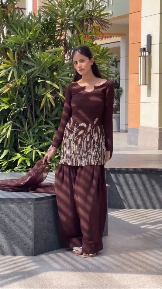 A Captivating Moment of Grace in a Brown Dress