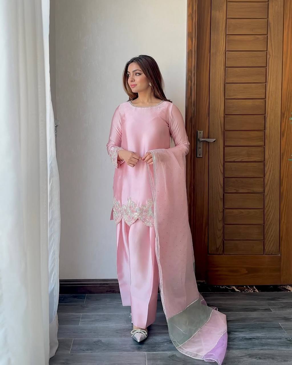 A Fashion-Forward Woman in Pink Suit