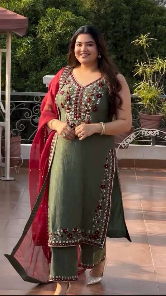 Chic Green Attire with Stunning Red Accents
